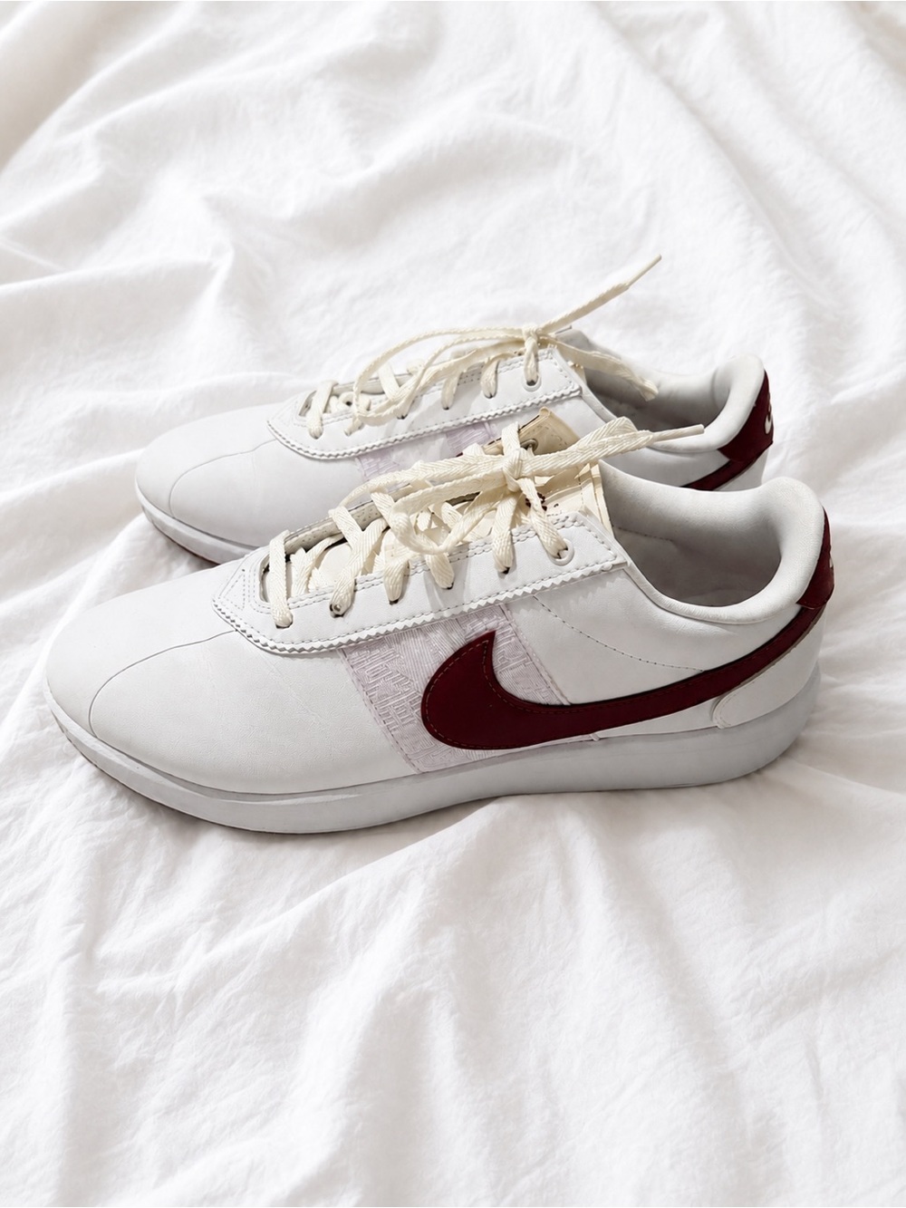 Nike White Sneakers with Maroon Swoosh